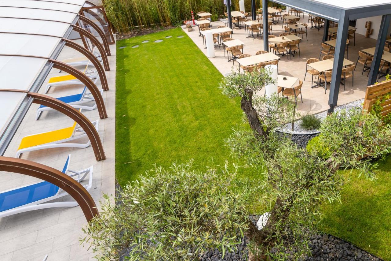 Logis Hotel Restaurant Le Clos Fleuri كاستيلنوداري المظهر الخارجي الصورة