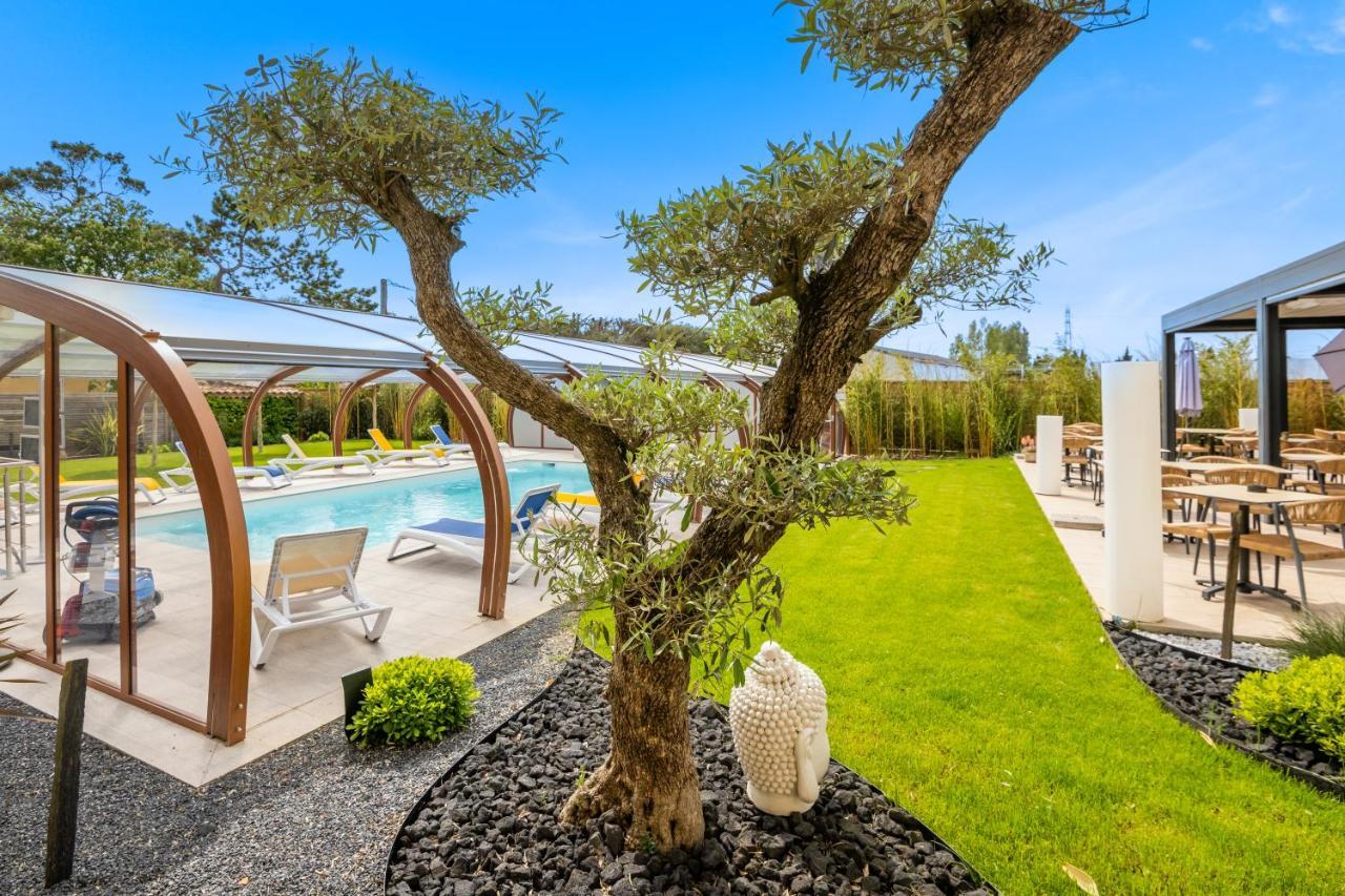 Logis Hotel Restaurant Le Clos Fleuri كاستيلنوداري المظهر الخارجي الصورة